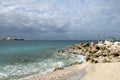 Grand Bahama Beach With A Cargo Ship And Ruins