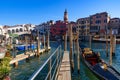 View of the Grand Canal, Rialto Bridge, and gondolas from outdoor restaurant seats, Venice Royalty Free Stock Photo