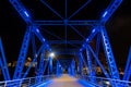 View of the Grand Rapids blue bridge from the river at night - Michigan