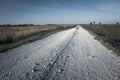 View of a gravel road, horizon and sky