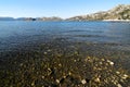 Gravely and clear sea by seaside in Hisaronu, Turkey