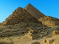 A view of the Great Pyramid at Giza, Egypt with small burial step pyramids in the foreground Royalty Free Stock Photo
