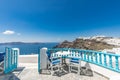 View of Greece Santorini, caldera view from restaurant, beautiful sea view and white architecture. Royalty Free Stock Photo