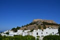 View of the greek Rhodes Islands Old Lindos Town, blue sky, bright colour, white little houses in the hill