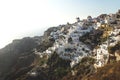 View on Greek village with wind mill with backlight, Oia, Santorini, Greece Royalty Free Stock Photo