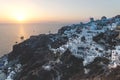 View on Greek village with wind mill during sunset, Oia, Santorini, Greece Royalty Free Stock Photo