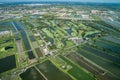 The view of green field and farm and city downtown in middle of Thailand. It shot from Jetplane