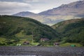 View of green hills and Camping side in Thorsmork Iceland. Camping tents, huts, cabins for tourists