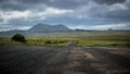 View on green Lanzarote vocanic landscape with rain clouds Royalty Free Stock Photo