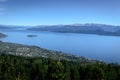 View of green pines in Bariloche. Sunny summer. Royalty Free Stock Photo