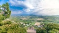 view of green summer valley of italian countryside timelapse with hills on background Royalty Free Stock Photo