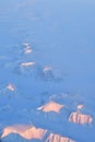 View of Greenland from Jet Plain Window in Winter Nature cold ice Mountains Royalty Free Stock Photo