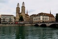 View of the view of the Grossmunster Cathedral and the Limmat river embankment in Zurich, Switzerland
