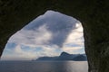 View from the grotto of the Aeolian harp in the town of Sudak to the sea and coastal rocks Royalty Free Stock Photo