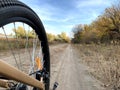 A view from the ground to a bicycle wheel