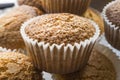 View of a group of freshly baked cupcakes.