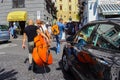 View of a group of musicians on the streets of Amalfi, who move with the instruments in their hands to go play in front of the Royalty Free Stock Photo