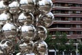 View of the Guggenheim Bilbao, reflected in Anish Kapoor\'s Tall Tree And The Eye sculpture Royalty Free Stock Photo