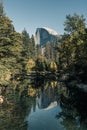 View of the Half Dome and the Merced River from the Sentinel Bridge in Yosemite National Park Royalty Free Stock Photo