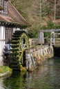 View of a half-timbered watermill at Blautopfsee in Blaubeuren at day in spring Royalty Free Stock Photo