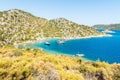 View of Hamidiye Bay in Kekova area of Antalya province of Turkey, with touring boats