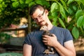 View on a man holding a baby turkey in his hands