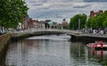 View of the HaPenny bridge in Dublin Ireland looking west