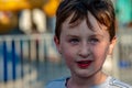 Happy young boy having fun on boardwalk amusement ride Royalty Free Stock Photo