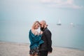 Happy young couple have fun on the beach, holding hands. Royalty Free Stock Photo