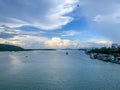 View of the harbor and boats catching fish in the evening.