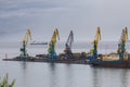 View of harbor cranes in the shipyard, Petropavlovsk-Kamchatsky, Russia.