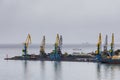 View of harbor cranes in the shipyard, Petropavlovsk-Kamchatsky, Russia.