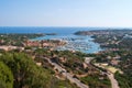 View of the region with the port and the town of Porto Cervo on the island of Sardinia. The sea, a city with lots of moored boats Royalty Free Stock Photo