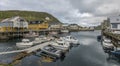 View on the harbor of remote fishing village in the VesterÃ¥len archipelago in the north of Norway. Royalty Free Stock Photo