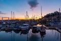 View of the harbor of Torquay at colorful sunset. Royalty Free Stock Photo