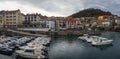 View of the harbor of the village of Mundaca in Vizcaya on a cloudy day