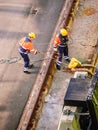 Harbor worker mooring ship in port of Helsinki