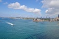 View from Harbour Bridge on Sydney Opera House and Sydney Harbour with its ferries, boats and yachts