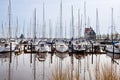 View on harbour of Volendam in the Netherlands. Sail boats on water. North sea.