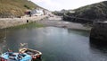 View from the harbour wall to Mullion Cornwall UK situated on Mounts Bay near Helston within Cornish Area outstanding beauty PAN