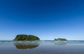 A view of Hauturu island from whangamata beach on the north island of new Zealand