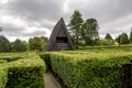 A view from Hazlehead Maze with planted bush hedges to the pyramid shaped entrance house, Aberdeen, Scotland