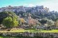 View of the hazy Athens Acropolis and Erechtheion from the Ancient Agora of Athens which used to be the central business district Royalty Free Stock Photo