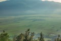 View of hazy green agricultural fields at the foot of Slivnica mountain in Slovenia