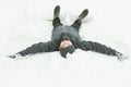 View from head of child laying flat in snow Royalty Free Stock Photo