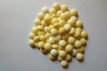 View of heap of round yellow xylitol mints from above