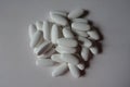 View of heap of white caplets of calcium citrate