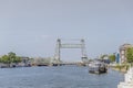 View of The Hef or the Koningshaven Bridge with a boat sailing on the canal Royalty Free Stock Photo