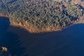 View from height on the autumn coast of the lake Dolysets top view. Pskov region, Russia