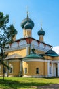 Russia, Uglich, July 2020. View of the old Orthodox cathedral on the river bank in the city center.